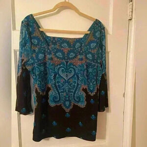 Inc women’s beautiful long sleeve nylon top.